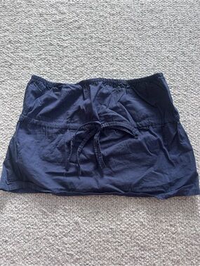 Edikted Navy Blue Elastic Waist Skirt with Pink Logo Tag